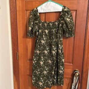 Tory Burch smocked mini dress. Olive background with beige flower flower print